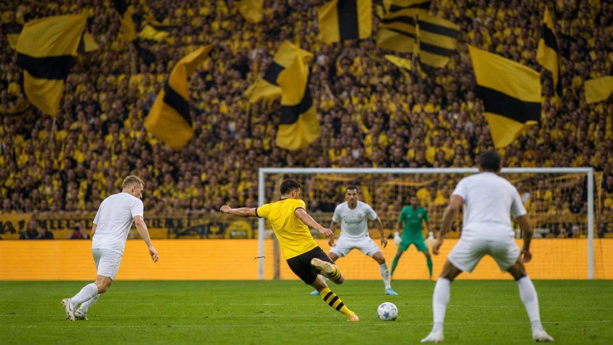 Football scene accompanying: Dortmund phone-free Yellow Wall debate grows after Frankfurt win