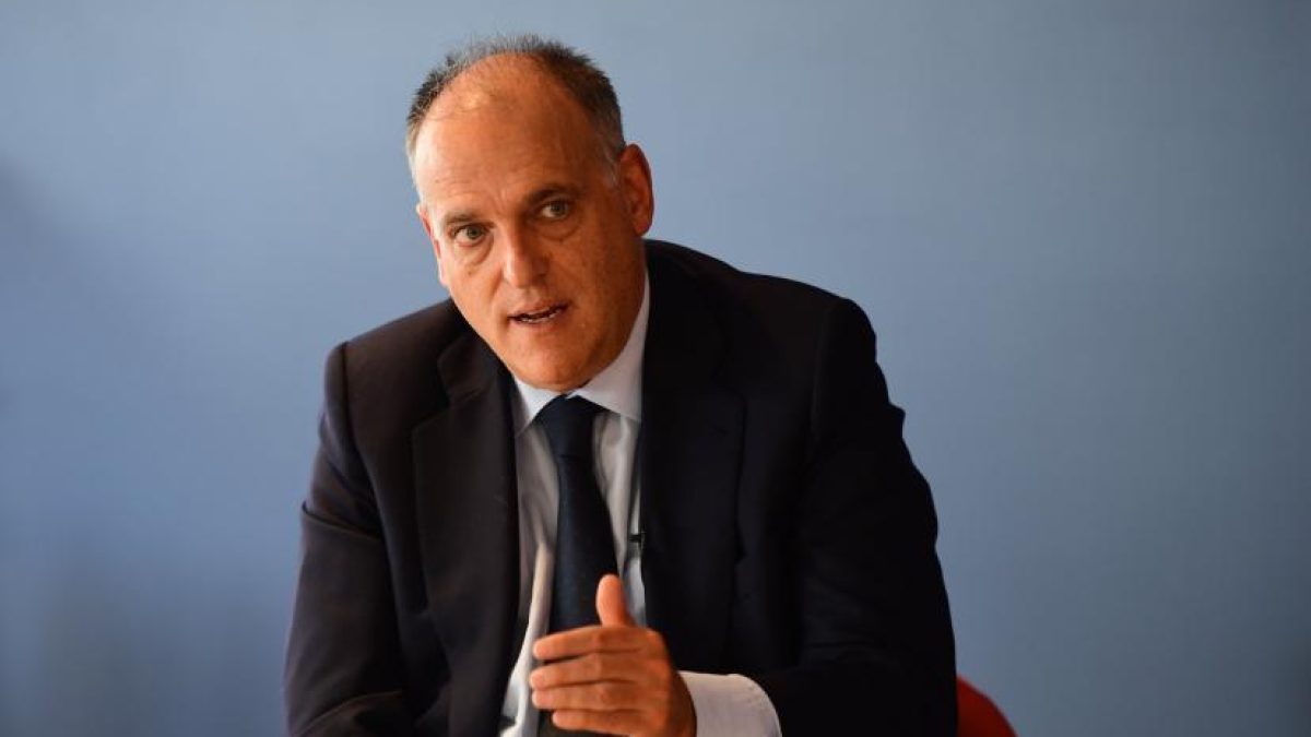 Real Madrid supporters display a banner during the Liga match against Sevilla as Javier Tebas reacts publicly
