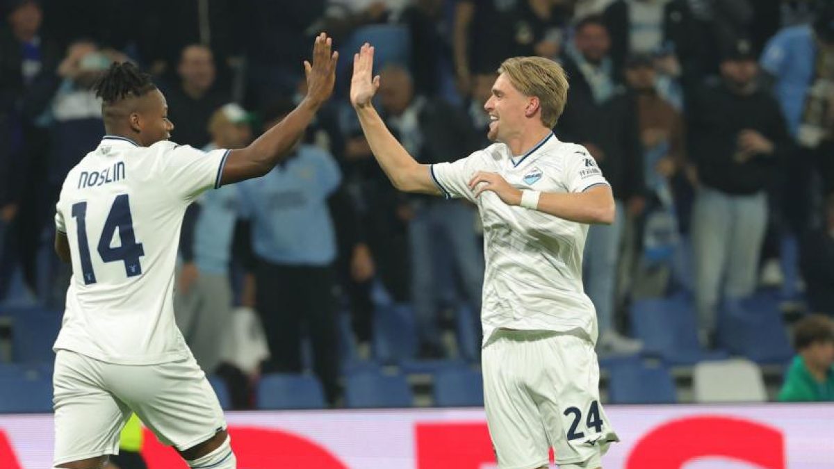 Lazio players celebrating on the pitch during a Serie A football match