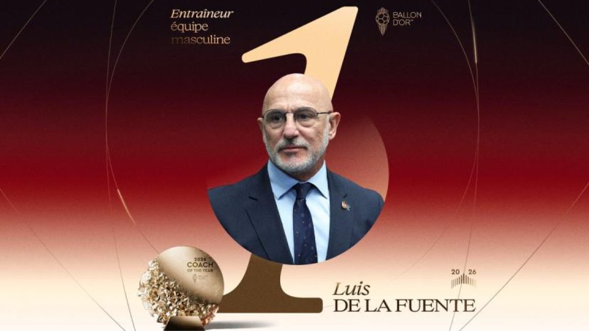 Luis de la Fuente holding a trophy or managing the Spanish national team